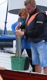 Obtaining a phytoplankton sample requires great strength and precision.